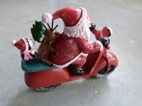 Kerstman op scooter