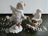 Dansende sneeuwpop met slee